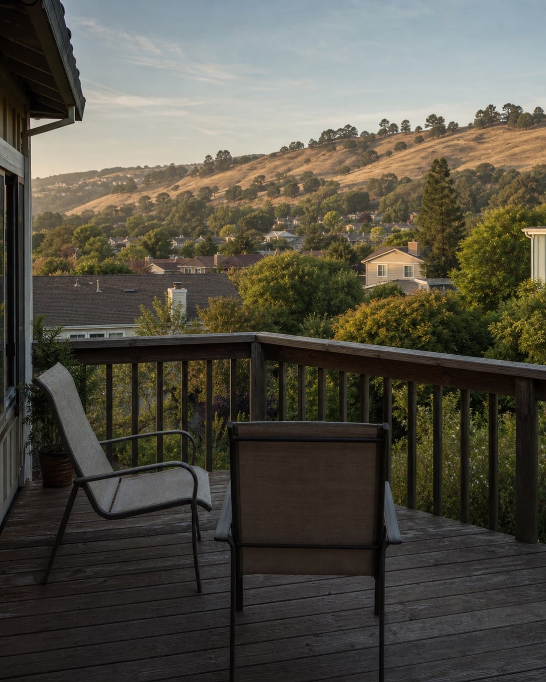 Established hillside neighborhood viewed from a simple residential deck
