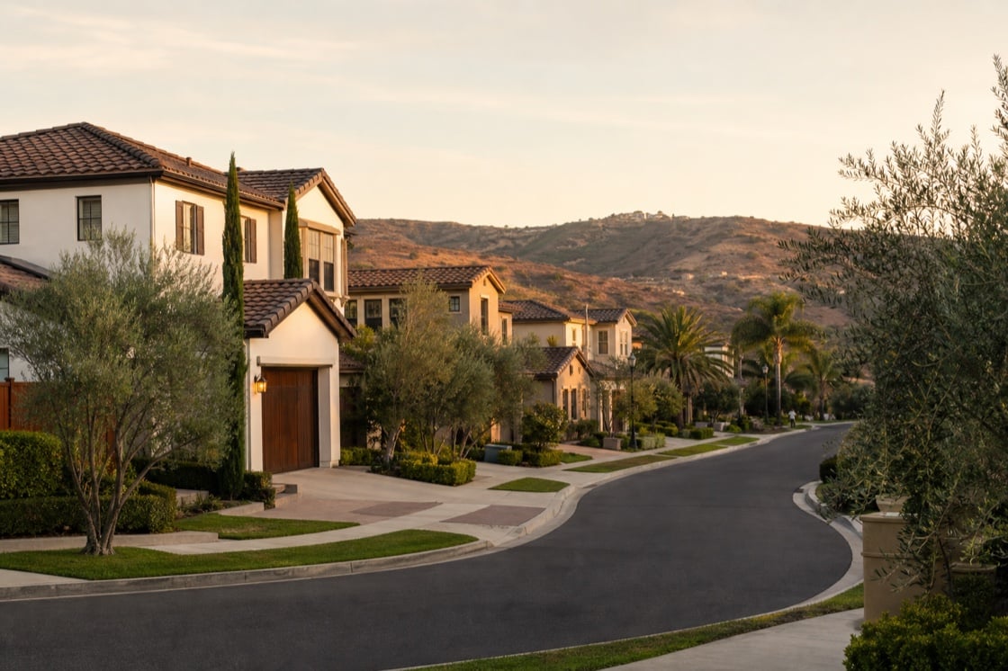 Refined planned Orange County neighborhood with tile-roof homes and dry foothills